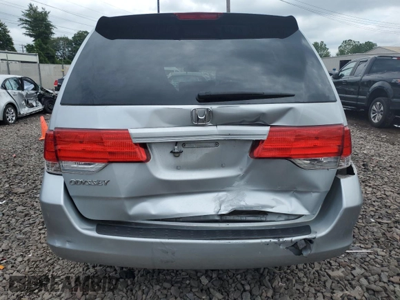 2010 Honda Odyssey LX with VIN 5FNRL3H2XAB059078, listed as a Copart auction lot 61144895 with 116,724 mi miles and Salvage title. Bid and sale history available at DreamBid. Image 6.