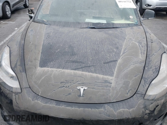 2019 Tesla Model 3 Mid Range with VIN 5YJ3E1EA2KF362048, listed as a IAAI auction lot 40141734 with 70,321 mi miles and . Bid and sale history available at carsss.com. Image 10.