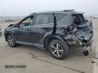 2018 Toyota RAV4 XLE with VIN 2T3RFREV8JW715099, listed as a Copart auction lot 51313485 with 140,107 mi miles and Salvage Title. Bid and sale history available at DreamBid. Image 2.