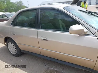 2002 Honda Accord LX z VIN 3HGCG56422G709092, wystawiony jako IAAI lot #42214711 z przebiegiem 94 386 mil mil oraz . Historia ofert i sprzedaży dostępna na DreamBid. Obrazek 14.