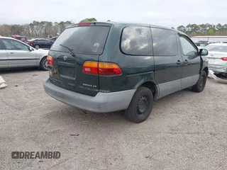 2000 Toyota Sienna CE with VIN 4T3ZF19C7YU240601, listed as a IAAI auction lot 41709617 with 999,999 mi miles. Bid and sale history available at carsss.com. Image 4.