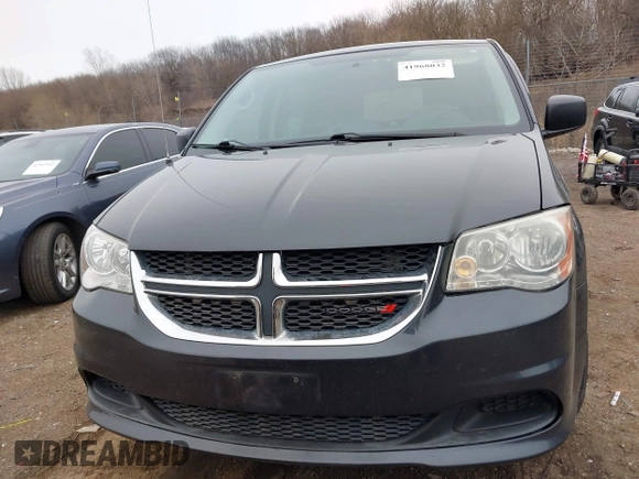 2014 Dodge Grand Caravan American Value with VIN 2C4RDGBG9ER463136, listed as a IAAI auction lot 41968032 with 184,138 mi miles and . Bid and sale history available at DreamBid. Image 6.