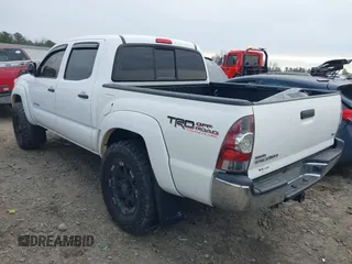 2013 Toyota Tacoma z VIN 5TFLU4EN2DX076815, wystawiony jako IAAI lot #41344839 z przebiegiem 311 083 mil mil oraz . Historia ofert i sprzedaży dostępna na DreamBid. Obrazek 3.