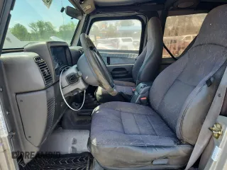 2001 Jeep Wrangler Sport with VIN 1J4FA49S21P374356, listed as a Copart auction lot 63568695 with 202,853 mi miles and Clean title. Bid and sale history available at DreamBid. Image 7.