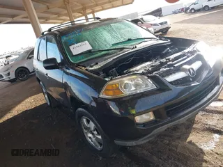 2004 Acura MDX with VIN 2HNYD18284H534118, listed as a IAAI auction lot 41563551 with 362,685 mi miles. Bid and sale history available at carsss.com. Image 1.