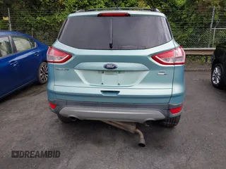 2013 Ford Escape SE with VIN 1FMCU9GX5DUD51120, listed as a IAAI auction lot 42196923 with 183,386 mi miles and . Bid and sale history available at DreamBid. Image 6.