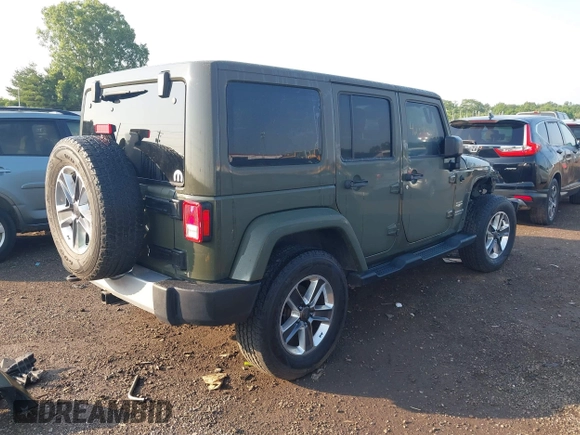 2015 Jeep Wrangler Unlimited Altitude с VIN 1C4HJWEG7FL584395, выставлен на аукционе IAAI как лот 42399987 с пробегом 142 906 миль миль и . История ставок и продаж доступна на DreamBid. Изображение 4.