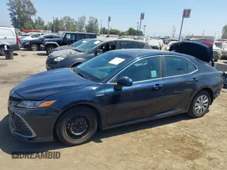 2021 Toyota Camry Hybrid LE with VIN 4T1C31AK5MU552226, listed as a IAAI auction lot 40210726 with 107,331 mi miles. Bid and sale history available at carsss.com. Image 15.