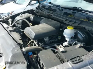 2020 Ram 1500 Tradesman z VIN 1C6RR6FG7LS114615, wystawiony jako IAAI lot #42061182 z przebiegiem 97 341 mil mil oraz . Historia ofert i sprzedaży dostępna na DreamBid. Obrazek 19.