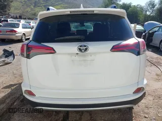 2017 Toyota RAV4 XLE with VIN JTMWFREV9HJ128521, listed as a IAAI auction lot 41658054 with 106,788 mi miles and . Bid and sale history available at DreamBid. Image 16.