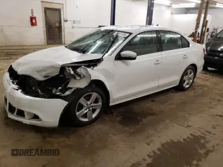 2014 Volkswagen Jetta TDI w/Premium с VIN 3VW3L7AJ3EM297108, выставлен на аукционе Copart как лот 81161134 с пробегом 160 656 миль миль и Списание • Salvage title. История ставок и продаж доступна на DreamBid. Изображение 1.