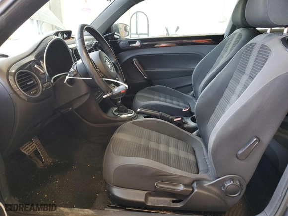 2012 Volkswagen Beetle 2.0T Turbo PZEV with VIN 3VWVA7AT1CM656081, listed as a Copart auction lot 43027995 with 63,802 mi miles and Clean Title. Bid and sale history available at carsss.com. Image 7.
