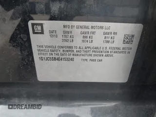 2014 Chevrolet Sonic LT z VIN 1G1JC5SB4E4153240, wystawiony jako IAAI lot #42383467 z przebiegiem 146 218 mil mil oraz . Historia ofert i sprzedaży dostępna na DreamBid. Obrazek 9.