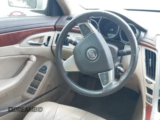 2008 Cadillac CTS RWD with VIN 1G6DV57V880128535, listed as a IAAI auction lot 39097540 with 153,140 mi miles and . Bid and sale history available at DreamBid. Image 16.