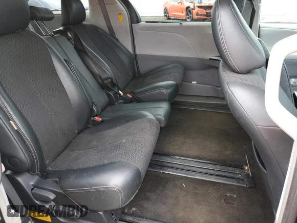 2014 Toyota Sienna SE with VIN 5TDXK3DC7ES425945, listed as a Copart auction lot 63067955 with 173,815 mi miles and Salvage title. Bid and sale history available at DreamBid. Image 10.