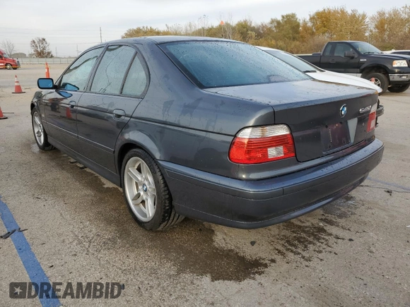2001 BMW 5 Series 540iA with VIN WBADN634X1GM73365, listed as a Copart auction lot 77814684 with 142,374 mi miles and Salvage Title. Bid and sale history available at carsss.com. Image 2.