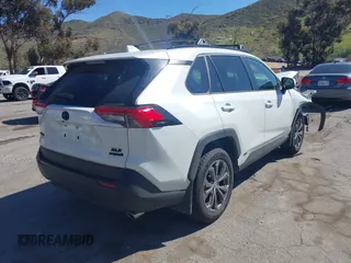 2024 Toyota RAV4 Hybrid XLE Premium with VIN JTMB6RFV3RJ059534, listed as a IAAI auction lot 41716721 with 6,319 mi miles. Bid and sale history available at carsss.com. Image 4.