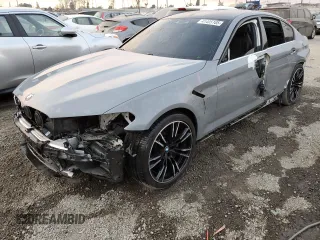 2018 BMW M5 z VIN WBSJF0C53JB282563, wystawiony jako Copart lot #41495105 z przebiegiem 53 132 mil mil oraz Szkody całkowita. Historia ofert i sprzedaży dostępna na DreamBid. Obrazek 1.