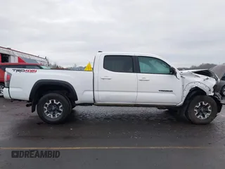 2021 Toyota Tacoma SR5 with VIN 3TMDZ5BN1MM100575, listed as a IAAI auction lot 41516274 with 61,974 mi miles and . Bid and sale history available at DreamBid. Image 14.