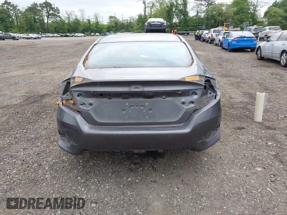 2017 Honda Civic LX z VIN 2HGFC2F54HH527421, wystawiony jako IAAI lot #42329336 z przebiegiem 97 655 mil mil oraz . Historia ofert i sprzedaży dostępna na DreamBid. Obrazek 16.