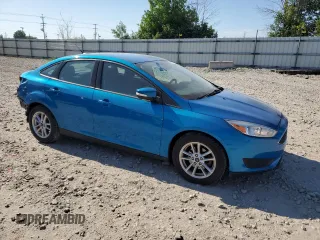 2017 Ford Focus SE z VIN 1FADP3F25HL218829, wystawiony jako Copart lot #63070195 z przebiegiem 64 039 mil mil oraz Czysty tytuł • Clean title. Historia ofert i sprzedaży dostępna na DreamBid. Obrazek 4.