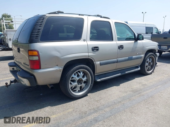 2002 Chevrolet Tahoe LS with VIN 1GNEC13Z22R173568, listed as a IAAI auction lot 42477491 with 277,090 mi miles and . Bid and sale history available at DreamBid. Image 4.