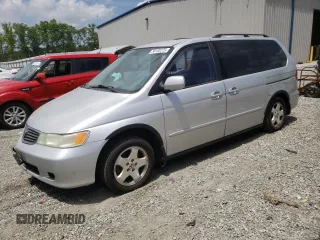 2001 Honda Odyssey EX z VIN 2HKRL18601H620817, wystawiony jako Copart lot #56100275 z przebiegiem 154 464 mil mil oraz Szkoda całkowita • Salvage title. Historia ofert i sprzedaży dostępna na DreamBid. Obrazek 1.