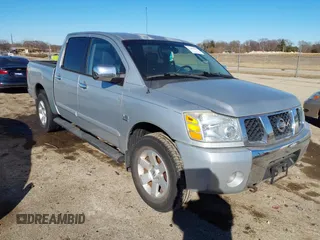 2004 Nissan Titan XE z VIN 1N6AA07B64N590414, wystawiony jako IAAI lot #41666493 z przebiegiem 167 779 mil mil oraz . Historia ofert i sprzedaży dostępna na DreamBid. Obrazek 1.