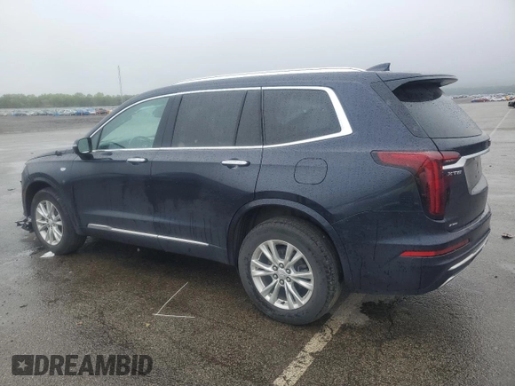 2021 Cadillac XT6 AWD Luxury with VIN 1GYKPBR4XMZ215970, listed as a Copart auction lot 56762225 with 47,800 mi miles and Salvage title. Bid and sale history available at DreamBid. Image 2.