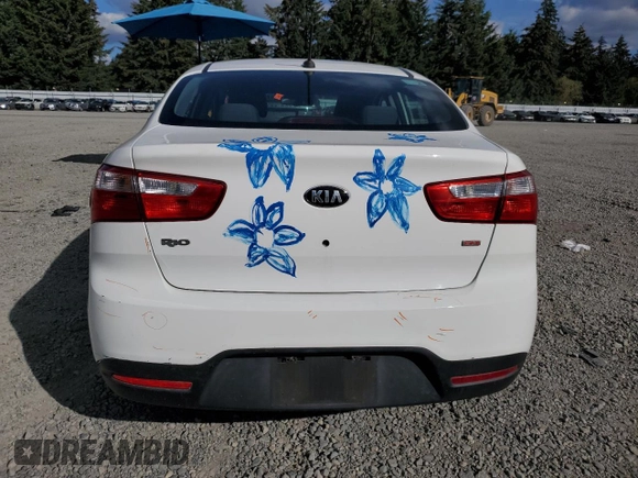 2013 Kia Rio LX with VIN KNADM4A38D6219536, listed as a Copart auction lot 72192754 with 74,307 mi miles and Salvage Title. Bid and sale history available at carsss.com. Image 6.