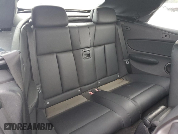 2012 BMW 1 Series 135i with VIN WBAUN7C59CVM26082, listed as a Copart auction lot 74711754 with 77,152 mi miles and Salvage title. Bid and sale history available at DreamBid. Image 10.