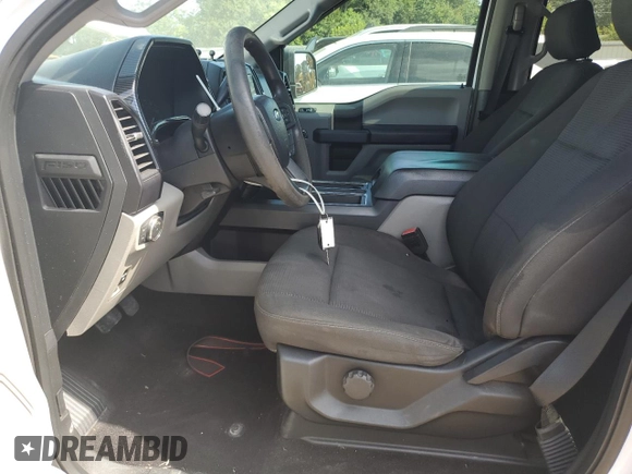 2018 Ford F-150 XL with VIN 1FTEW1CPXJKF27567, listed as a Copart auction lot 63034034 with 125,508 mi miles and Salvage title. Bid and sale history available at DreamBid. Image 7.