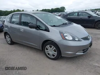 2009 Honda Fit with VIN JHMGE87239S024587, listed as a IAAI auction lot 42670510 with 154,000 mi miles and . Bid and sale history available at DreamBid. Image 1.