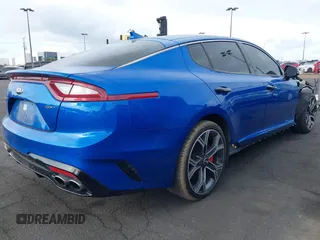 2018 Kia Stinger GT with VIN KNAE35LC5J6010230, listed as a IAAI auction lot 41924415 with 123,572 mi miles. Bid and sale history available at carsss.com. Image 4.