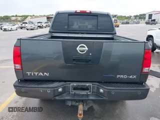 2010 Nissan Titan Pro-4X with VIN 1N6BA0EC9AN323943, listed as a IAAI auction lot 42795482 with 200,453 mi miles and . Bid and sale history available at DreamBid. Image 16.