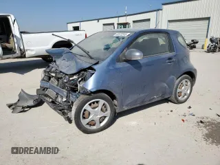 2014 Scion iQ with VIN JTNJJXB01EJ029897, listed as a Copart auction lot 48572245 with 0 mi miles and Salvage Title. Bid and sale history available at carsss.com. Image 1.