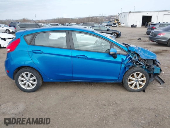 2013 Ford Fiesta SE with VIN 3FADP4EJ6DM130511, listed as a IAAI auction lot 41757636 with 153,664 mi miles. Bid and sale history available at carsss.com. Image 13.