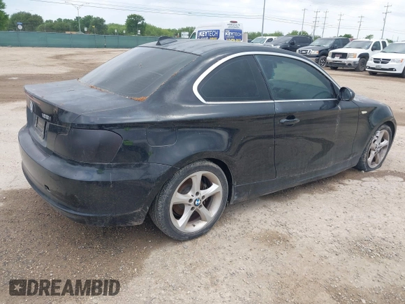 2009 BMW 1 Series 128i with VIN WBAUP73579VK75780, listed as a IAAI auction lot 42198035 with 136,100 mi miles and . Bid and sale history available at carsss.com. Image 4.