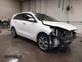 2016 Kia Sorento SX with VIN 5XYPKDA51GG077698, listed as a IAAI auction lot 41501354 with 185,494 mi miles. Bid and sale history available at carsss.com. Image 1.