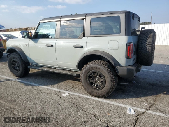 2024 Ford Bronco Wildtrak z VIN 1FMEE2BP8RLA57115, wystawiony jako Copart lot #43579085 z przebiegiem 4951 mil mil oraz Szkody całkowita. Historia ofert i sprzedaży dostępna na DreamBid. Obrazek 2.