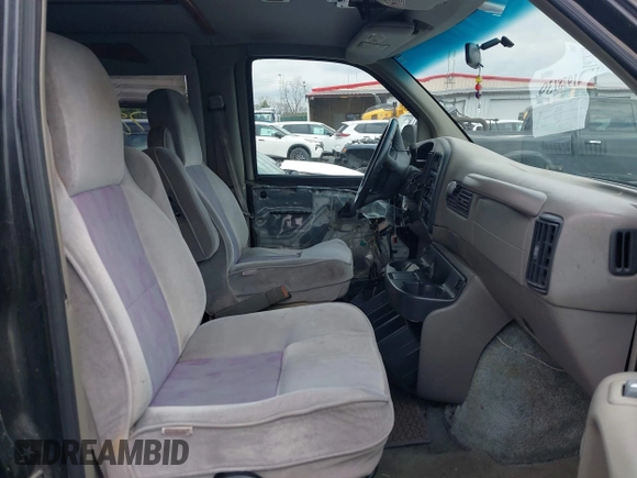 1999 Chevrolet Chevy Van z VIN 1GBFG15M0X1048842, wystawiony jako IAAI lot #41978139 z przebiegiem 188 274 mil mil oraz . Historia ofert i sprzedaży dostępna na DreamBid. Obrazek 5.