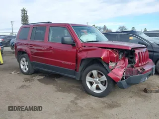 2016 Jeep Patriot Latitude with VIN 1C4NJPFB0GD582527, listed as a IAAI auction lot 41494076 with 166,263 mi miles and . Bid and sale history available at DreamBid. Image 13.