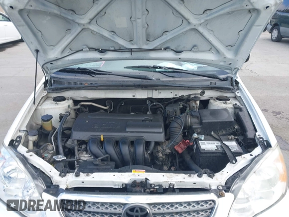 2004 Toyota Corolla CE with VIN JTDBR32E440052035, listed as a IAAI auction lot 42218301 with 299,999 mi miles. Bid and sale history available at carsss.com. Image 10.