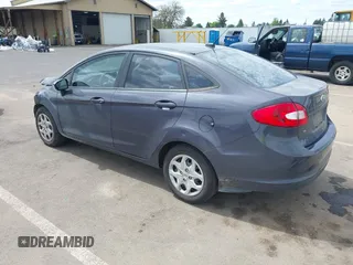 2013 Ford Fiesta SE z VIN 3FADP4BJ3DM186569, wystawiony jako IAAI lot #42128913 z przebiegiem 19 228 mil mil oraz . Historia ofert i sprzedaży dostępna na DreamBid. Obrazek 3.