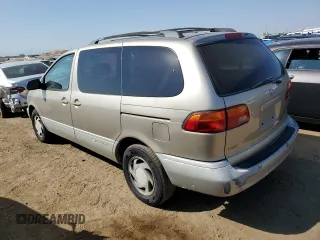 2000 Toyota Sienna LE with VIN 4T3ZF13C3YU229328, listed as a Copart auction lot 70880244 with 201,464 mi miles and Salvage Title. Bid and sale history available at carsss.com. Image 2.