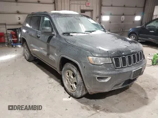 2017 Jeep Grand Cherokee Laredo with VIN 1C4RJFAG6HC661836, listed as a IAAI auction lot 41622814 with 134,509 mi miles. Bid and sale history available at carsss.com. Image 1.