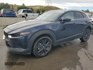 2023 Mazda CX-30 Premium Plus with VIN 3MVDMBEY9PM500907, listed as a Copart auction lot 70871494 with 38,599 mi miles and Salvage title. Bid and sale history available at DreamBid. Image 1.