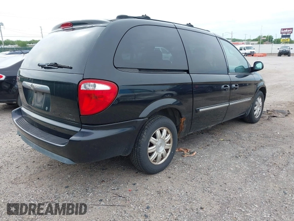 2005 Chrysler Town & Country Touring with VIN 2C4GP54L45R277761, listed as a IAAI auction lot 42144191 with 140,864 mi miles and . Bid and sale history available at DreamBid. Image 4.