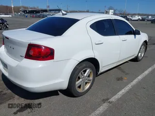 2012 Dodge Avenger SXT with VIN 1C3CDZCB7CN196369, listed as a IAAI auction lot 41932665 with 136,568 mi miles and . Bid and sale history available at carsss.com. Image 4.
