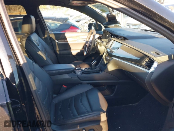 2024 Cadillac XT6 AWD Sport z VIN 1GYKPHRS4RZ700307, wystawiony jako IAAI lot #41257556 z przebiegiem 18 292 mil mil oraz . Historia ofert i sprzedaży dostępna na DreamBid. Obrazek 5.